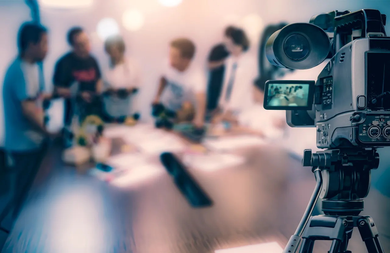 Professional camera filming a live media production